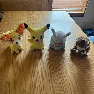 Lot of 4 Tomy Pokemon Stuffed Aniamals Pikachu, Goomy, Fennekin and XY Tyrunt